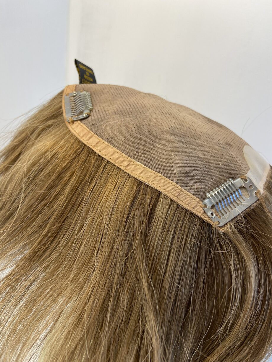 Brown hair piece. Brss730