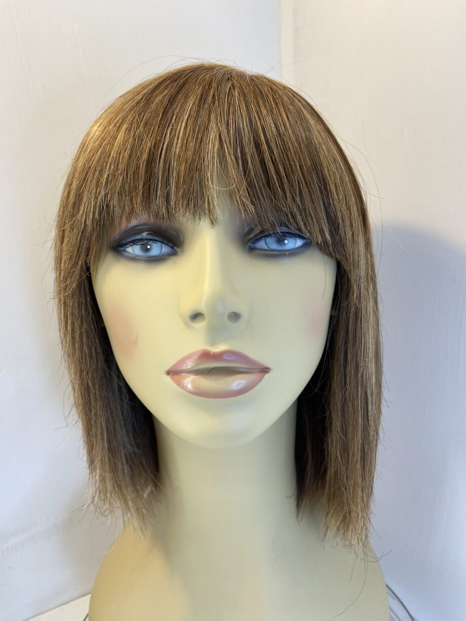 Blonde highlighted Rene of Paris wig. Brms216