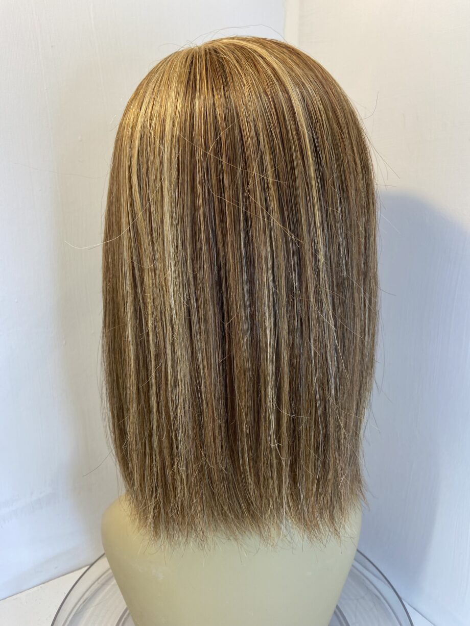 Blonde highlighted Rene of Paris wig. Brms216