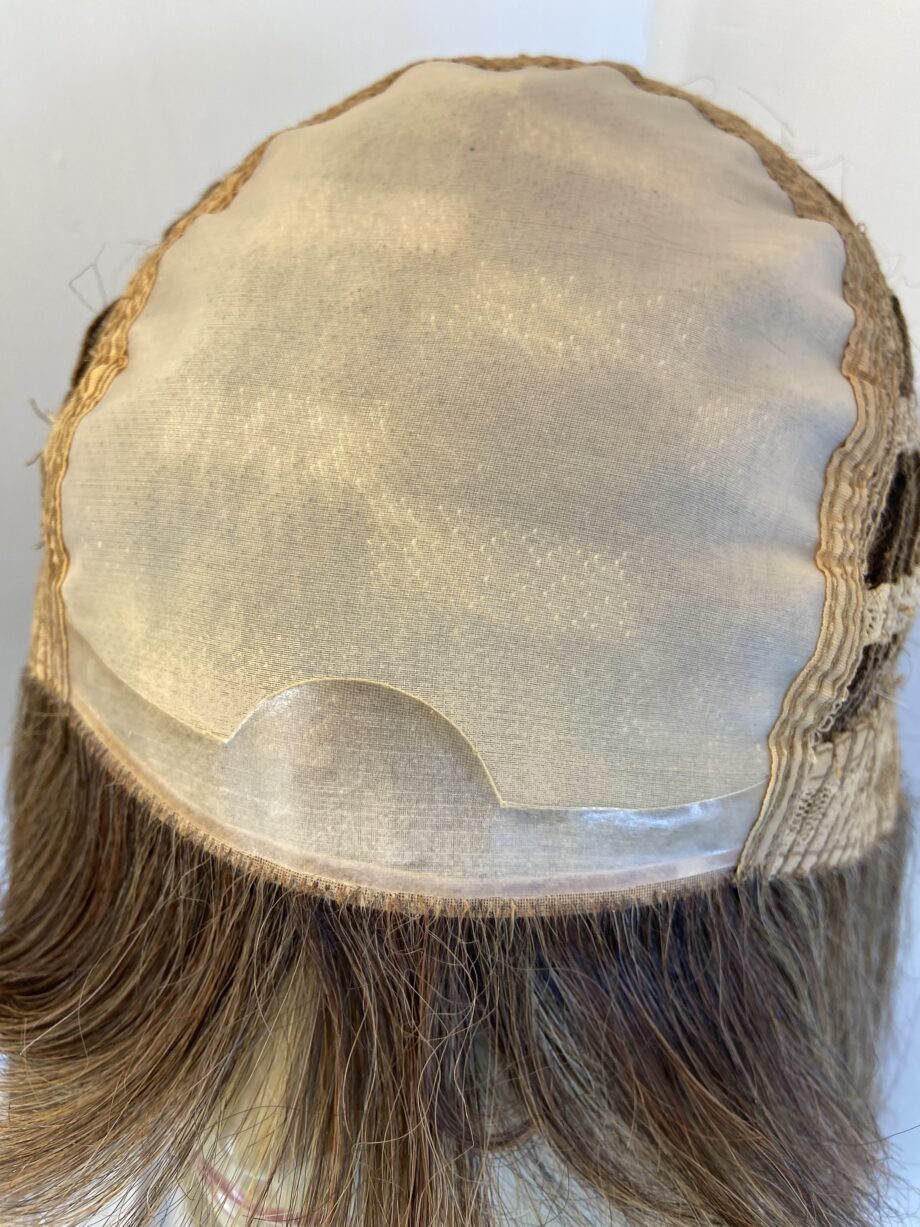 Blonde highlighted Rene of Paris wig. Brms216