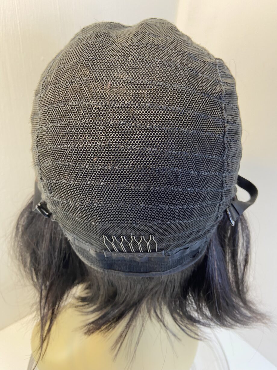New black mid length wig. Blms411