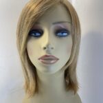 Highlighted honey blonde mid length wig. Blms526