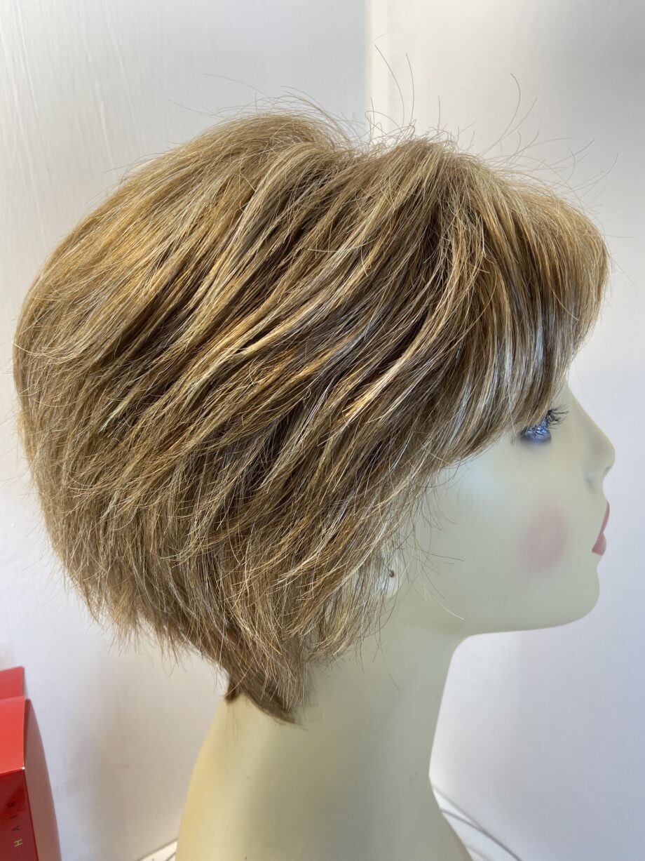 Light brown highlight boxed Rene of Paris wig. Bbpss473