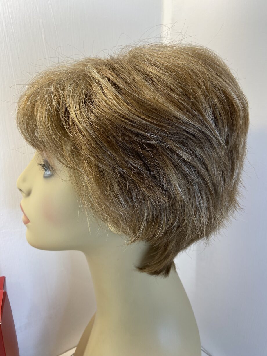 Light brown highlight boxed Rene of Paris wig. Bbpss473