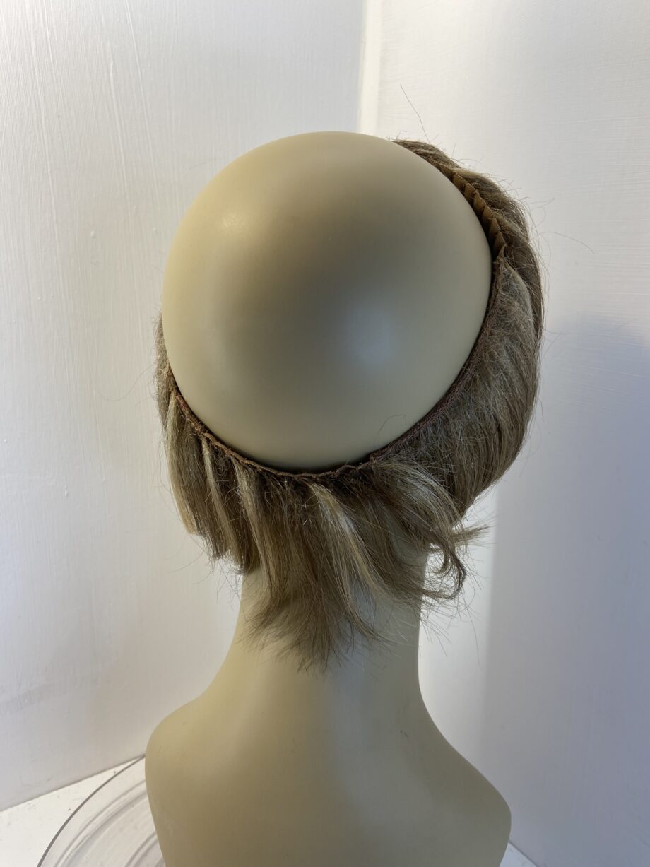 Hair piece. 105