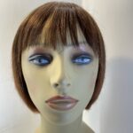 Reddish brown wig. Brms313
