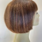 Reddish brown wig. Brms313
