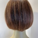Reddish brown wig. Brms313