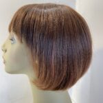 Reddish brown wig. Brms313