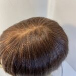 Reddish brown wig. Brms313