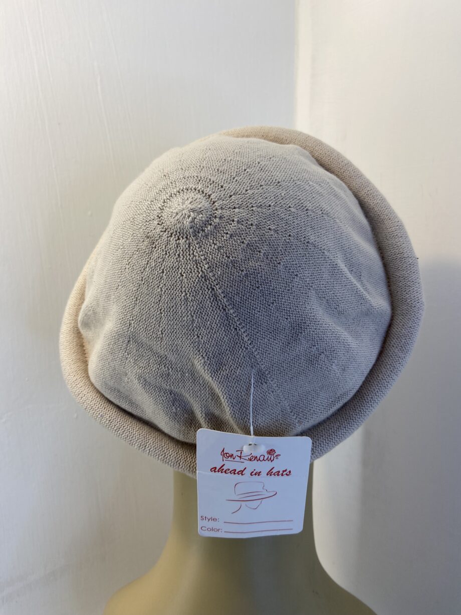 New cream hat. 106
