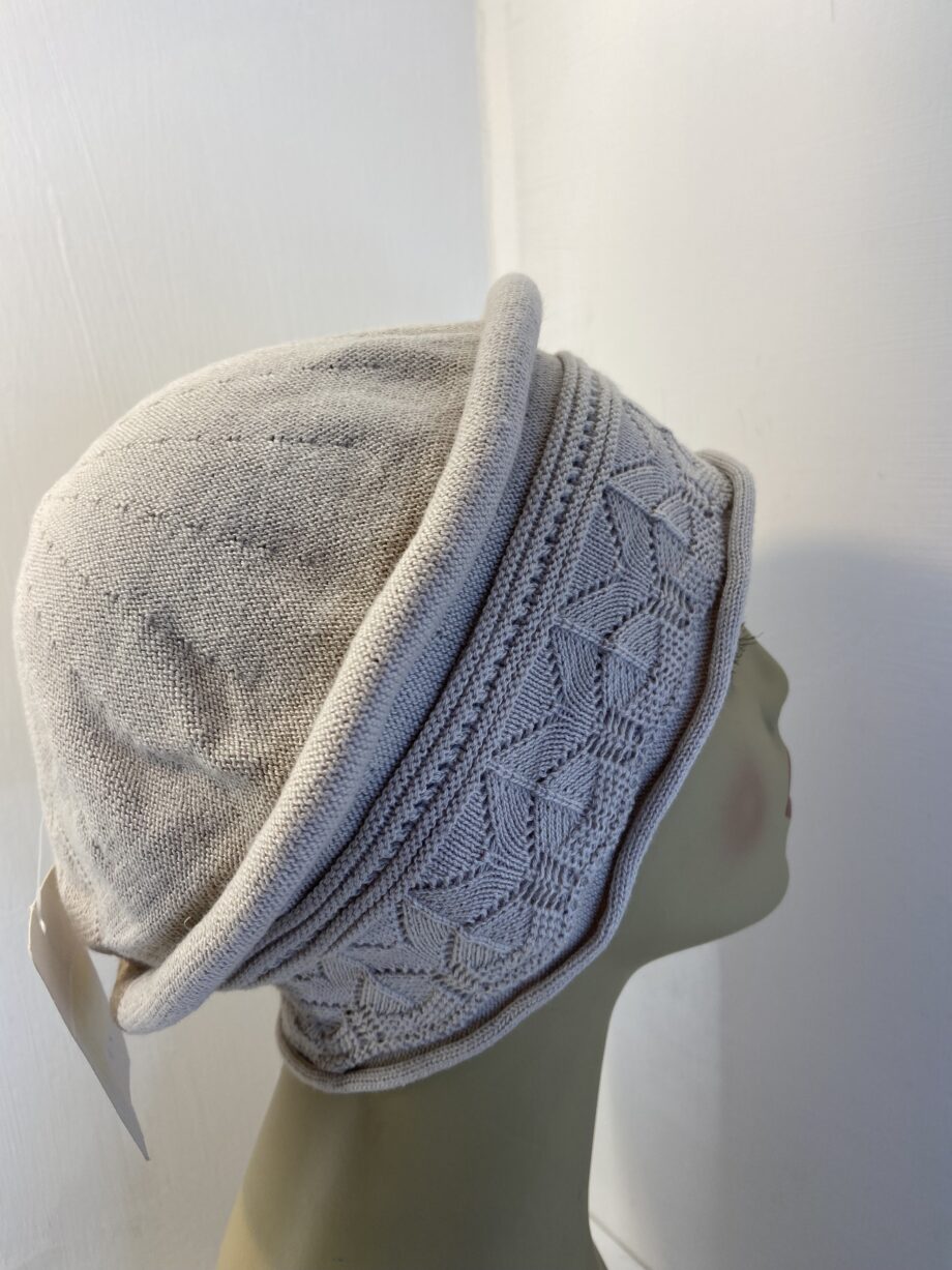 New cream hat. 106