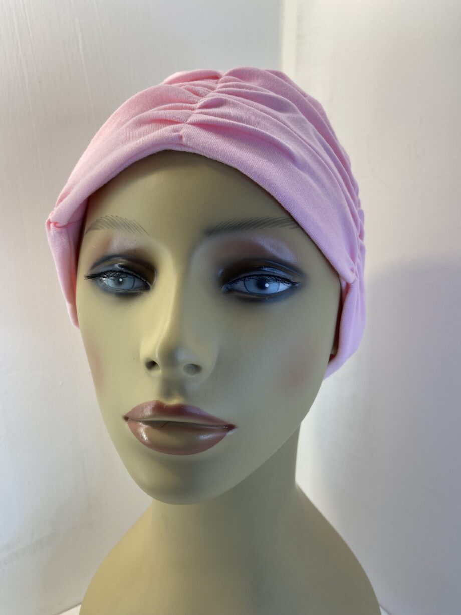 Pink headwear. 109
