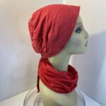 Red headwear and scarf. 112