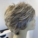 Stylish blonde new designer donated wig. Bblsw484