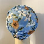 Blue floral hat. 122