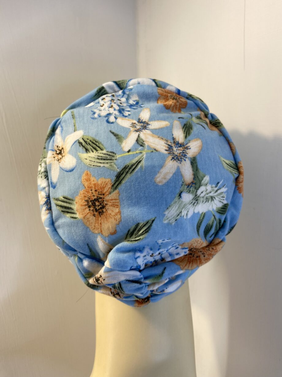 Blue floral hat. 122