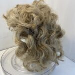 Blonde curly hair piece. 136