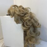 Blonde curly hair piece. 136
