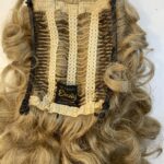 Blonde curly hair piece. 136