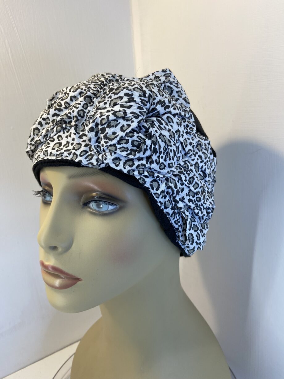 Black and white hat. 138