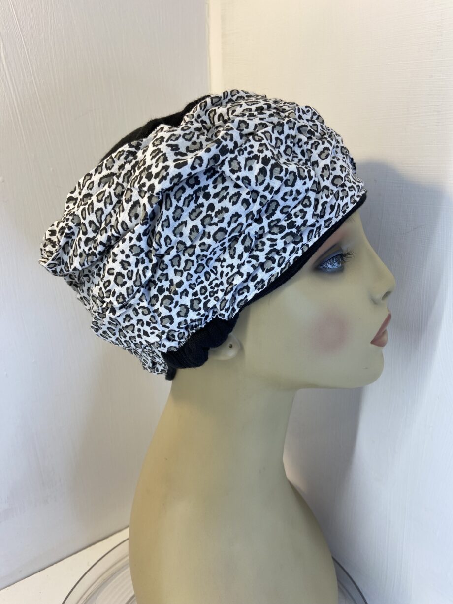 Black and white hat. 138