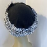 Black and white hat. 138