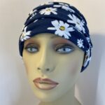 Blue with white flowers hat. 139