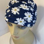 Blue with white flowers hat. 139