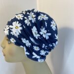 Blue with white flowers hat. 139