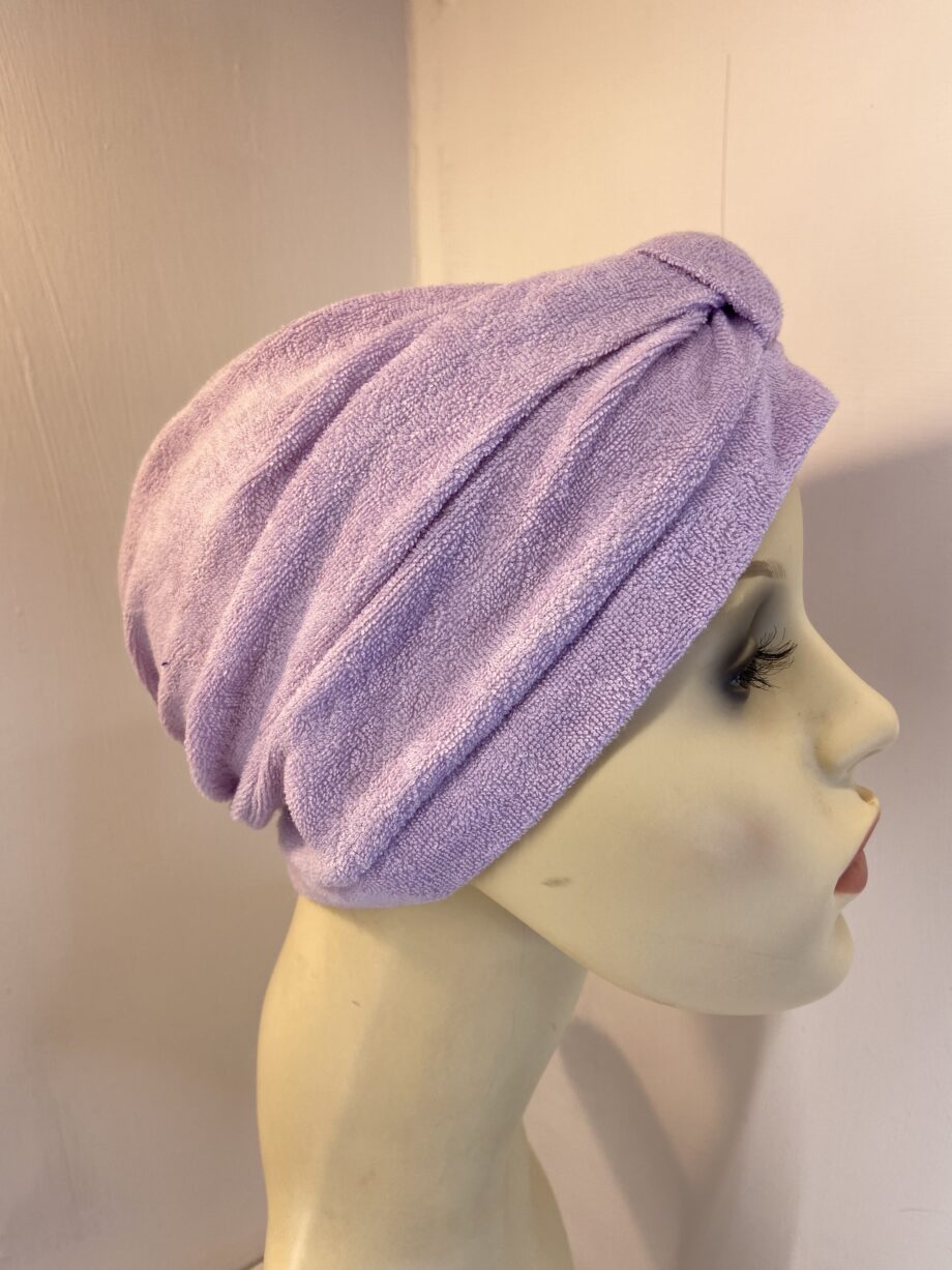 Light purple hat. 143