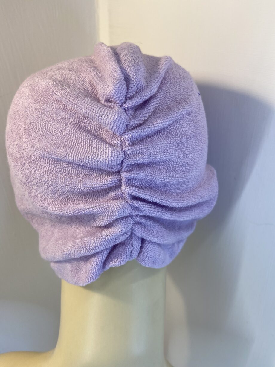 Light purple hat. 143