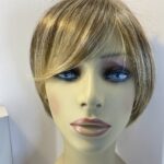 Boxed blonde Raquel Welch wig. Bblss492