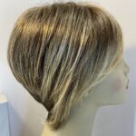 Boxed blonde Raquel Welch wig. Bblss492