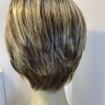Boxed blonde Raquel Welch wig. Bblss492