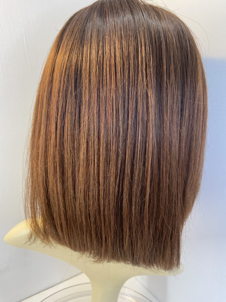 Reddish brown long Amore wig. Brls623