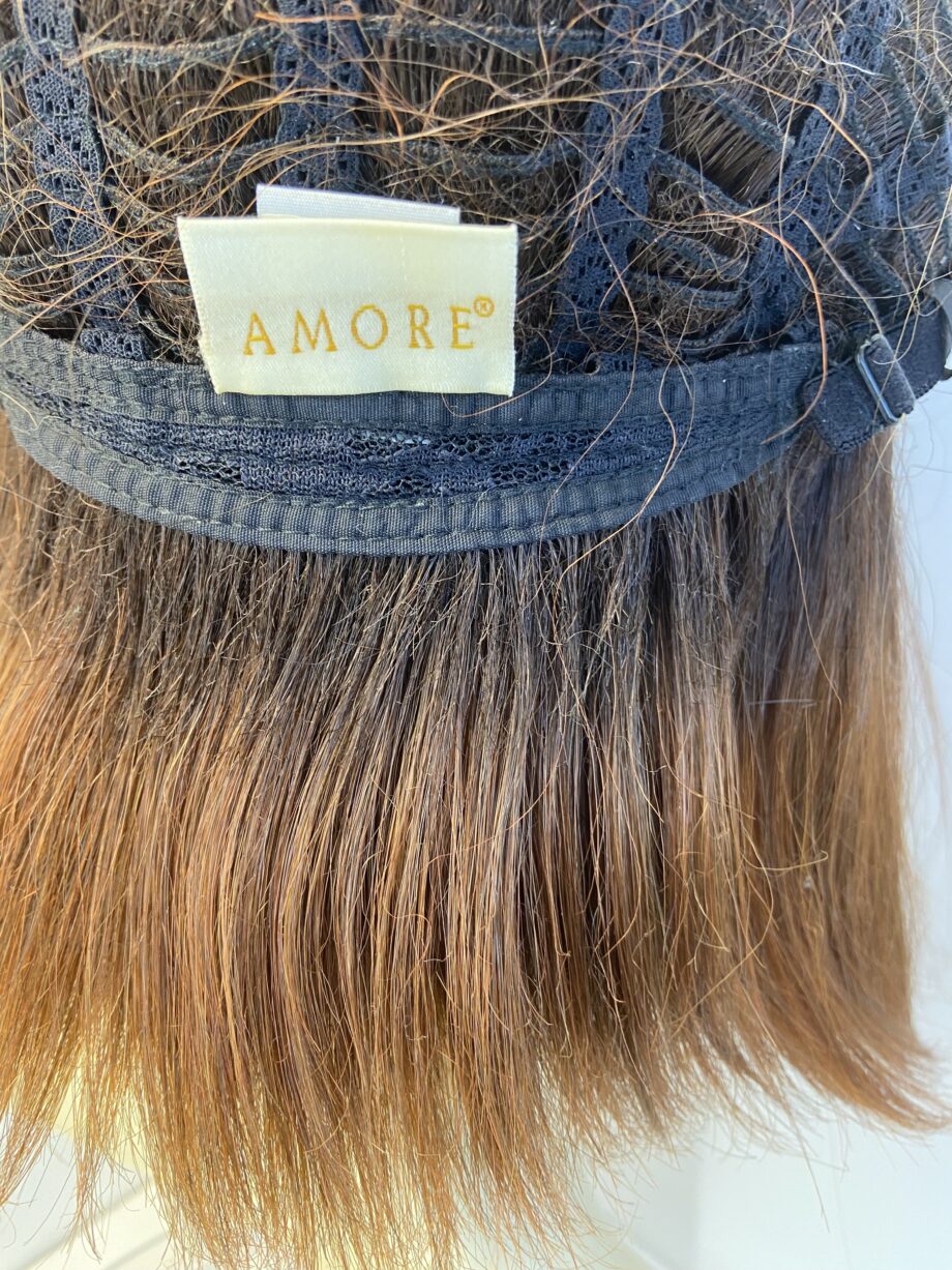 Reddish brown long Amore wig. Brls623