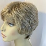 New boxed blonde wheat  designer wig. Bblsw694
