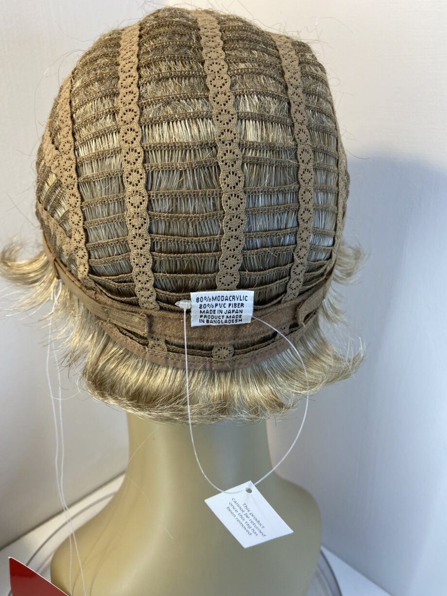 New boxed blonde wheat  designer wig. Bblsw694