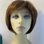 Judy plum as new reddish  brown boxed wig. Bbrms701