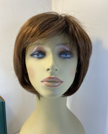 Judy plum as new reddish  brown boxed wig. Bbrms701