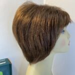 Judy plum as new reddish  brown boxed wig. Bbrms701