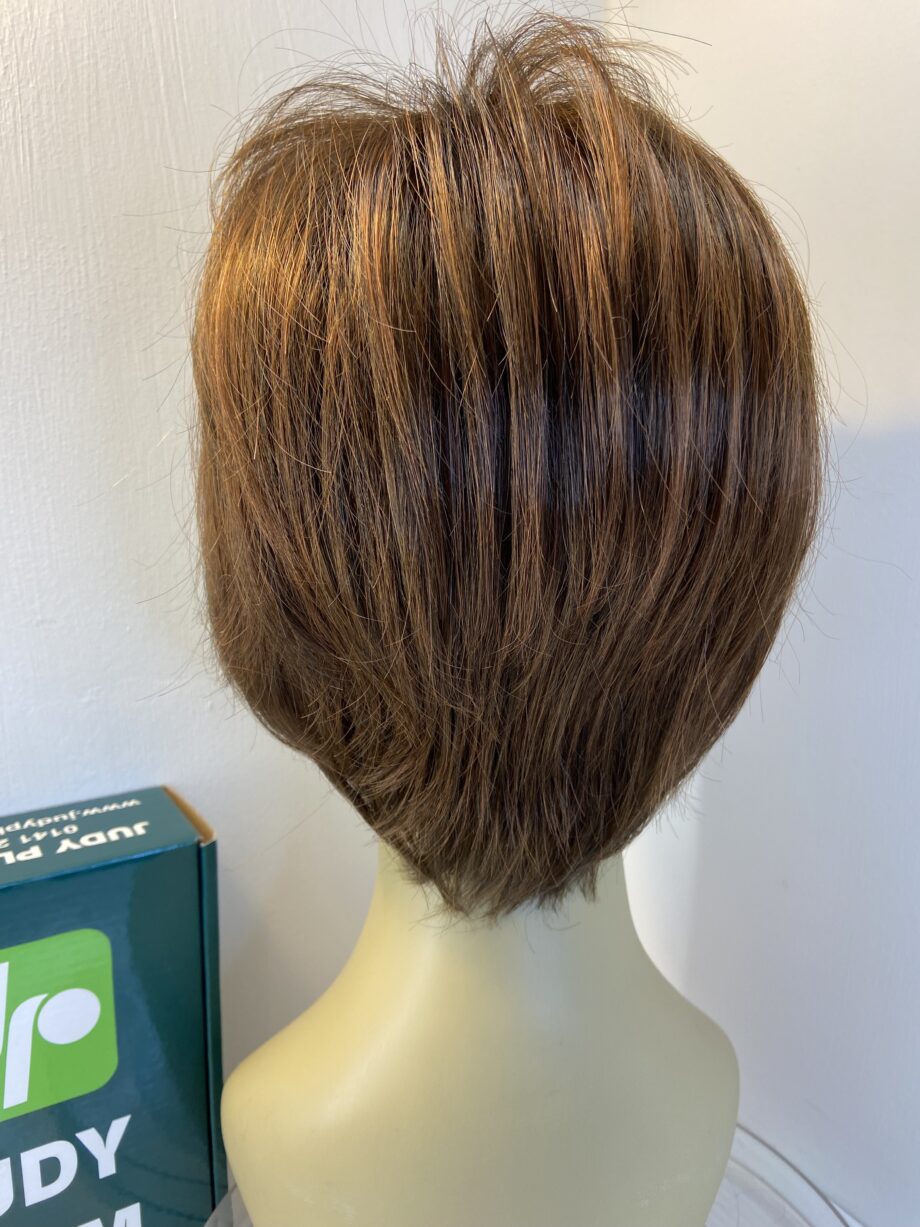 Judy plum as new reddish  brown boxed wig. Bbrms701