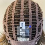 Judy plum as new reddish  brown boxed wig. Bbrms701