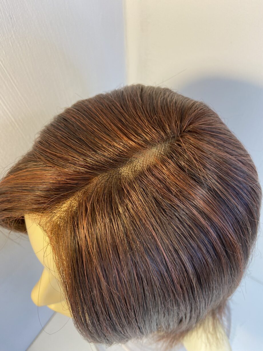 Long reddish brown wig. Brls149