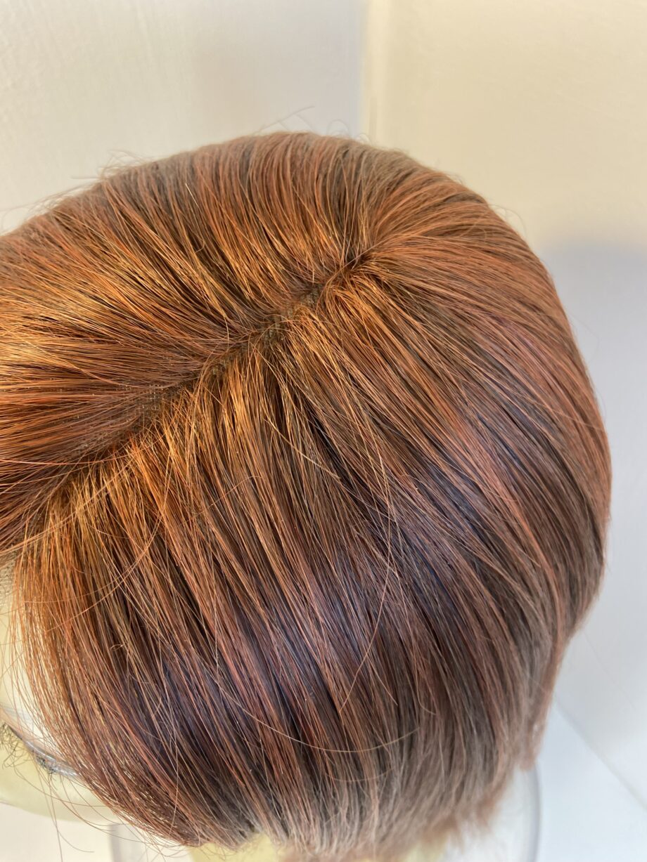 Reddish brown long wig. Brls150