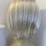 New light blonde feather wig. Bblms754