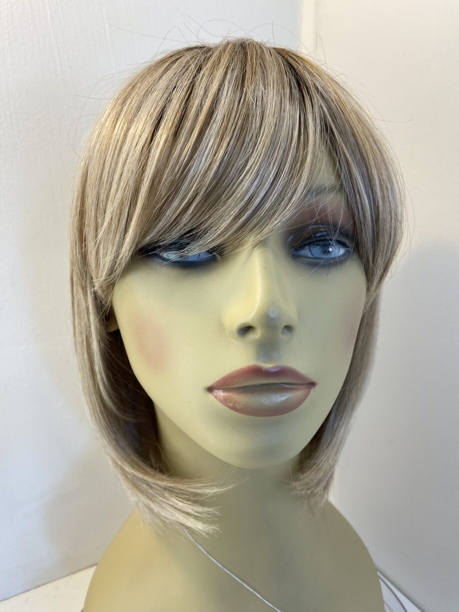 New Raquel Welch mid  length wig. Blms875