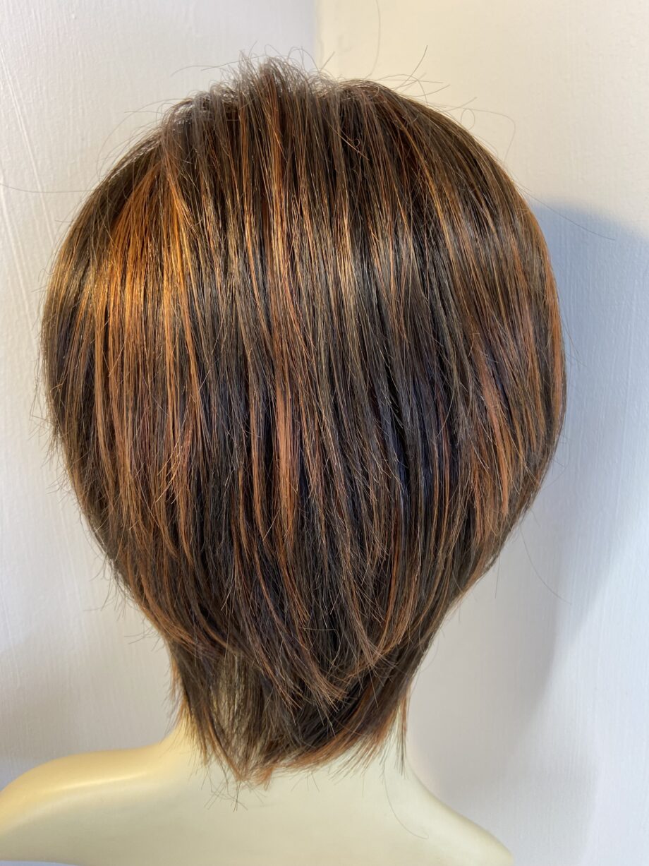 Stunning as new reddish brown designer wig. Bbrss828