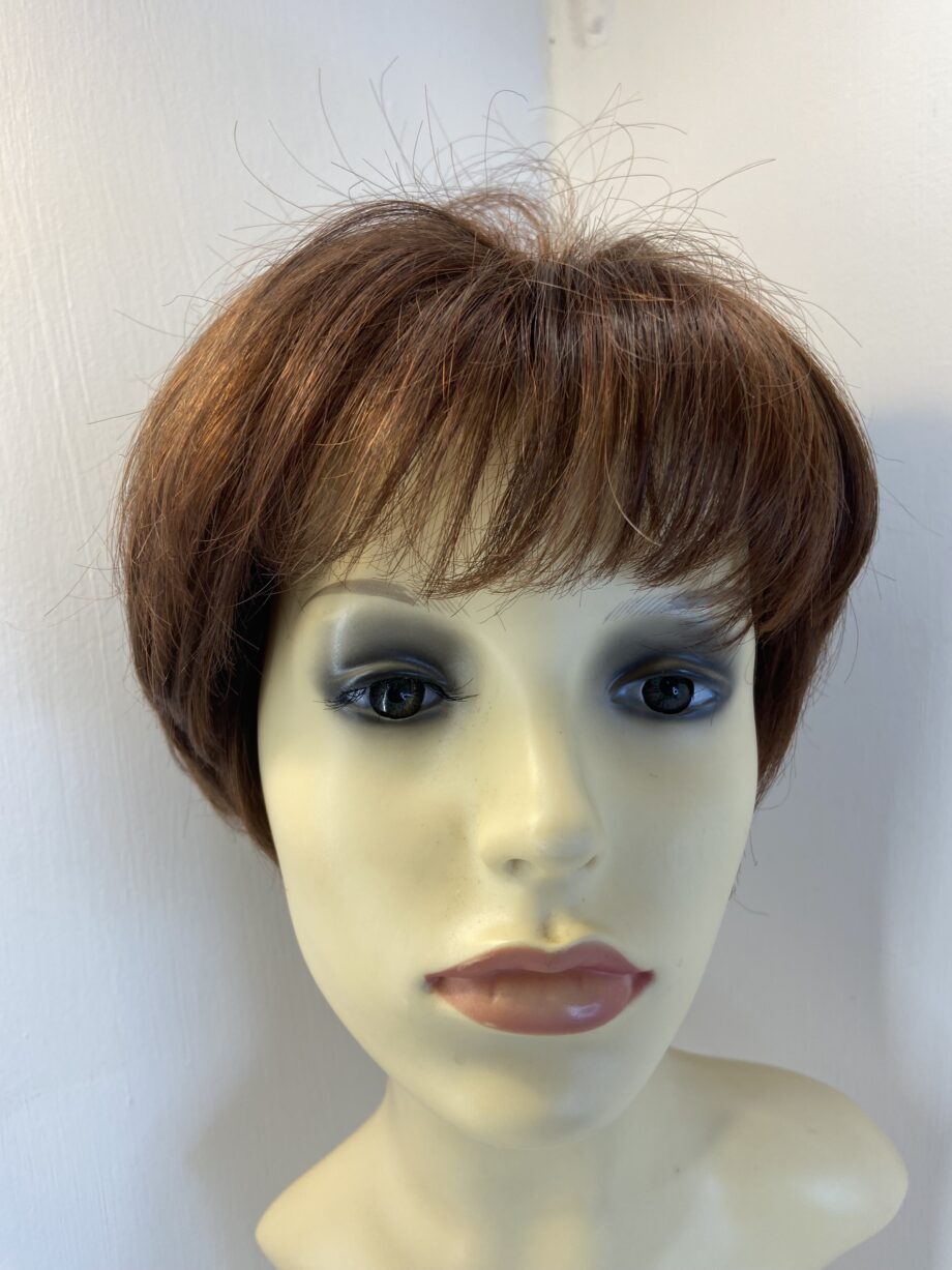 Superior reddish brown wig. Rss691